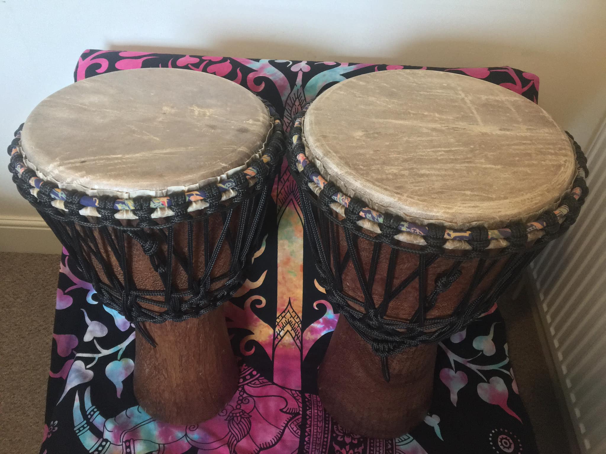 Two Africa drums after being rebuilt